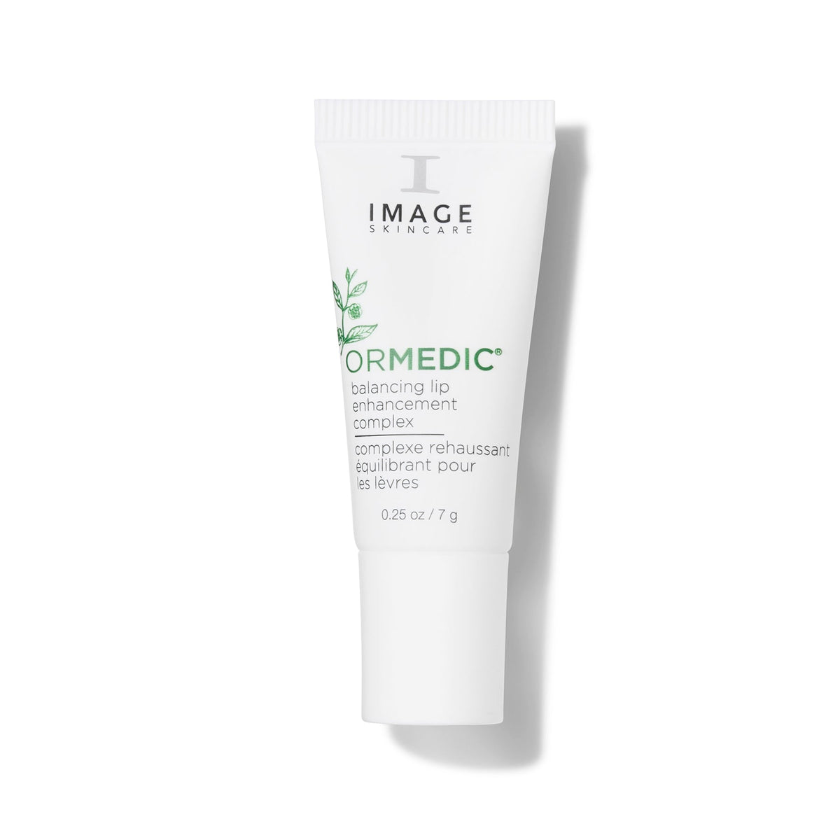 Tube blanc ORMEDIC complexe rehaussant équilibrant pour les lèvres d’Image Skincare, brin de feuillage vert, fond blanc
