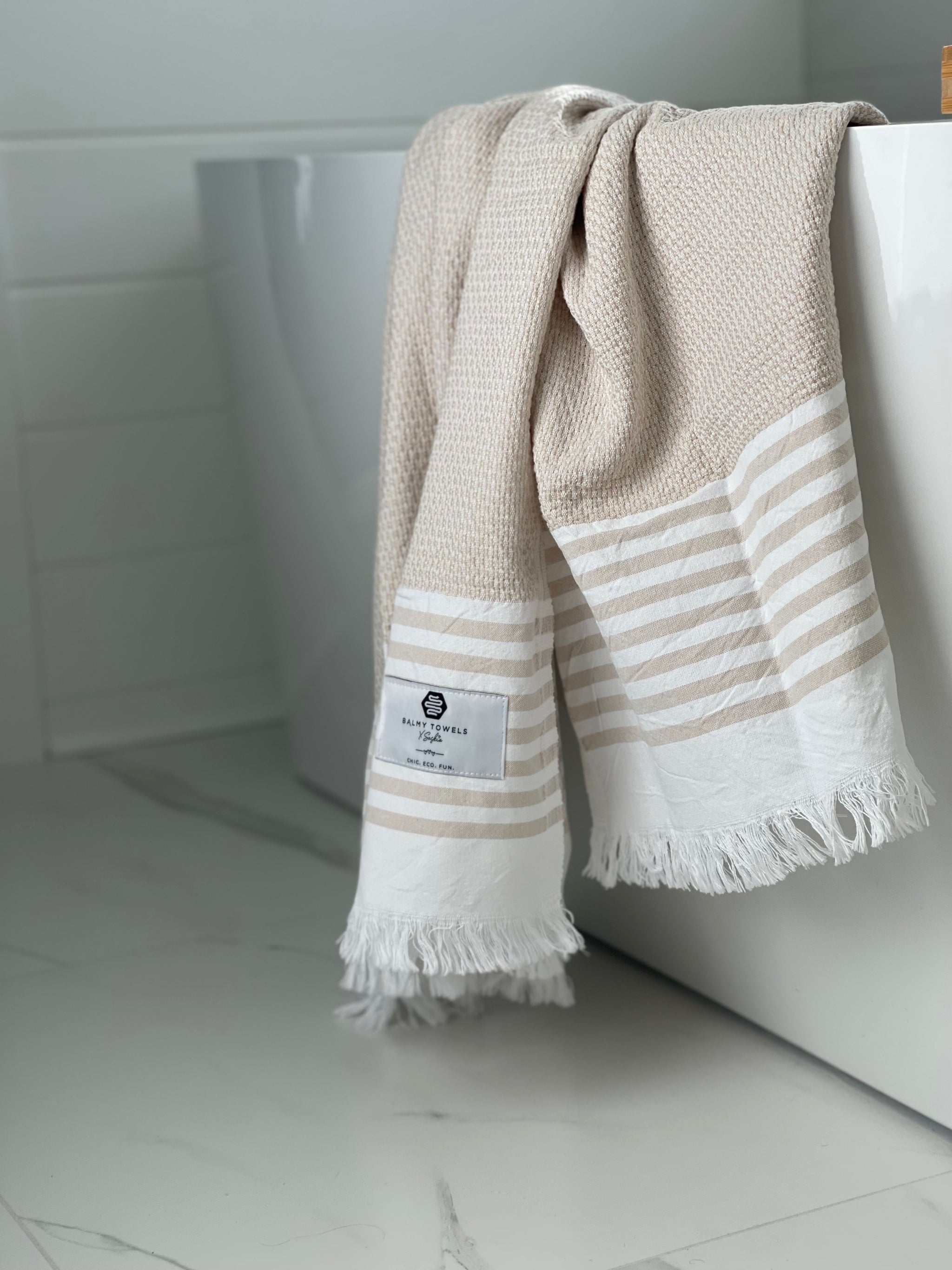 Neutral-tone Gabby towel draped beautifully – photographed by Dans le sac